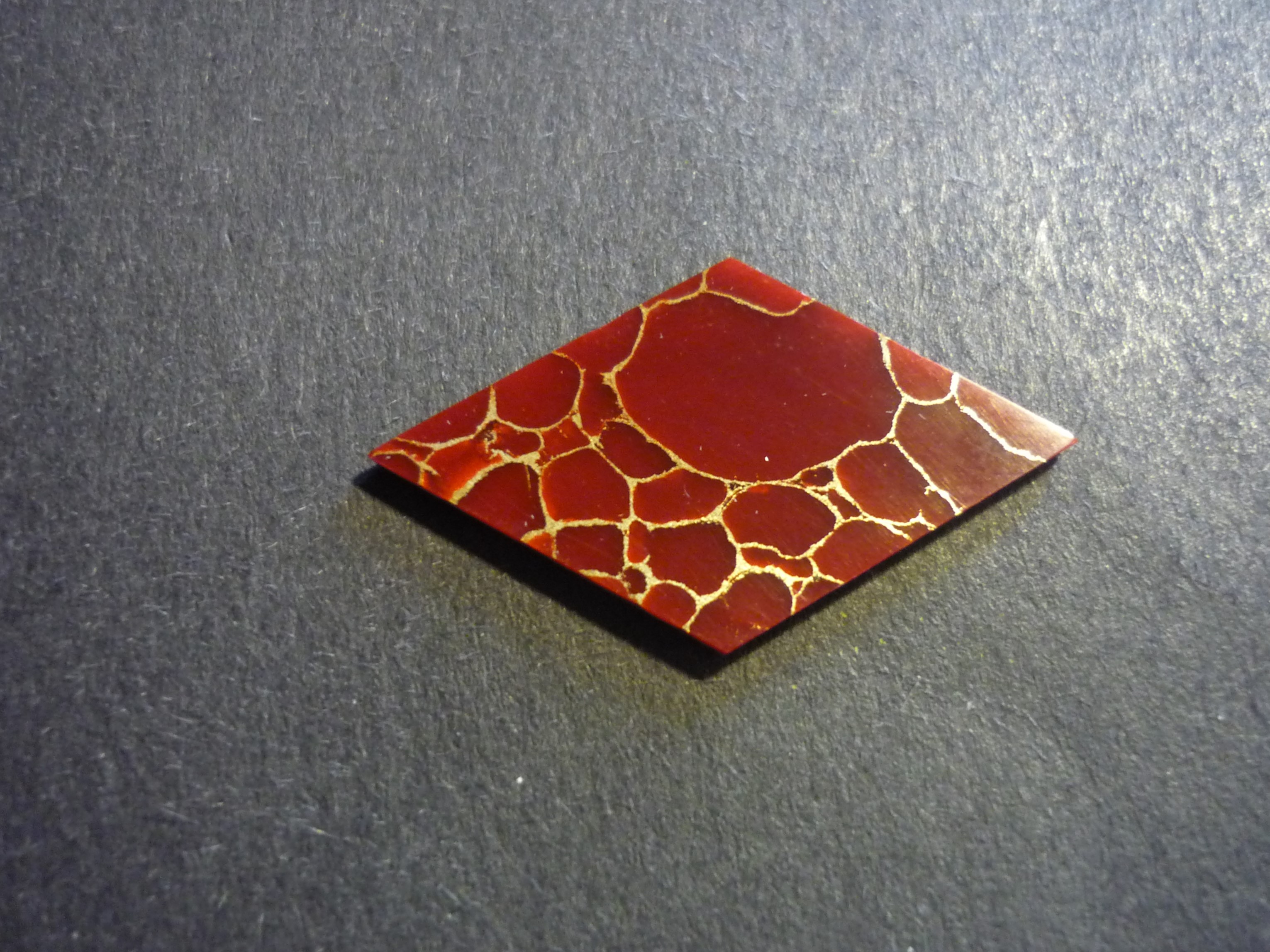 Escutcheon in Red w Gold Web